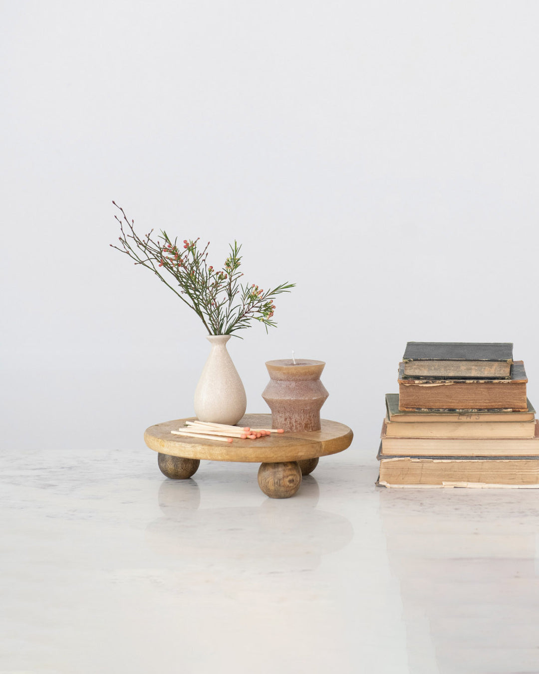 Pedestal de madera redondo
